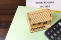 Notice of foreclosure of a house. Concept of eviction for non-payment of a mortgage to the bank. Rising interest rates. House and