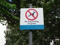 A notice prohibiting dogs from fouling on the grass