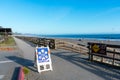 Notice for state park beach visitors to practice social distancing