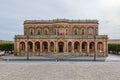 The Palazzo Ducezio building in Noto, Sicily, Italy with a rounded staircase in front of the entrance