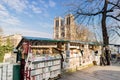 Notre Dame and bouquiniste or bookstall Paris