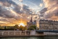 Notre Dame cathedral against colorful sunset during spring time in Paris, France Royalty Free Stock Photo