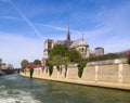 Notre Dame Cathedral over Seine river in spring. Before the fire. April 05, 2019. Paris France Royalty Free Stock Photo