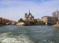 Notre Dame Cathedral over Seine river in spring. Before the fire. April 05, 2019. Paris France Royalty Free Stock Photo