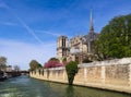 Notre Dame Cathedral over Seine river in spring. Before the fire. April 05, 2019. Paris France Royalty Free Stock Photo