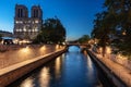 Notre Dame Cathedral in Paris by the Seine River at dawn, France Royalty Free Stock Photo