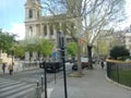 Notre Dame Cathedral, people, cars and trees in the tourist city of Paris