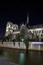 Notre-Dame cathedral and Seine river by night Royalty Free Stock Photo