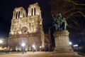 Notre Dame church and statue in Paris