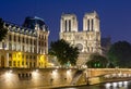 Notre-Dame de Paris cathedral on Cite island at night, France Royalty Free Stock Photo