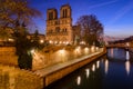 Notre Dame de Paris cathedral at dawn with the Seine River. Ile de La Cite, Paris, France