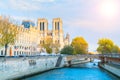 Notre Dame de Paris cathedral, France. Wonderful gothic architecture in autumn. View from the Seine river. Royalty Free Stock Photo