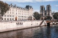 Notre Dame de Paris cathedral next to the Hotel Dieu Hospital above the river Seine in Paris, France Royalty Free Stock Photo