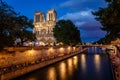 Notre Dame de Paris Cathedral and Seine River in the Evening Royalty Free Stock Photo