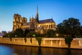 Notre Dame de Paris Cathedral and Seine River in the Evening Royalty Free Stock Photo