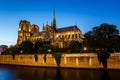 Notre Dame de Paris Cathedral and Seine River in the Evening