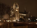 Notre Dame de Paris Cathedral and Seine River in the Night, Paris, France Royalty Free Stock Photo