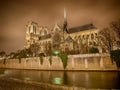 Notre Dame de Paris Cathedral and Seine River in the Night, Paris, France Royalty Free Stock Photo