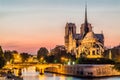 Notre dame de paris and the seine by night river France Royalty Free Stock Photo