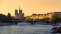 Notre Dame de Paris, the Seine River and Ile Saint Louis at sunset. France Royalty Free Stock Photo