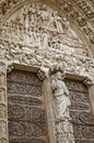 Notre dame entrance portal's decorations Saints sculptures detail.