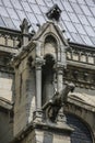 Notre Dame of Paris, France, ancient statue on roof, gargoyle Royalty Free Stock Photo