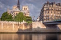 Notre Dame of Paris on Seine River at peaceful sunrise, France Royalty Free Stock Photo