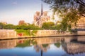 Notre Dame of Paris on Seine River reflection at sunrise, France Royalty Free Stock Photo