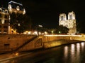 Notre Dame and the Seine at Night, Paris Royalty Free Stock Photo