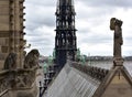 Notre Dame Spire, La Fleche, and roofs before the fire. View of the Apostles, angel statue, chimeras and gargoyles. Paris, France. Royalty Free Stock Photo