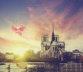Notre Dame at sunset in Paris , France with cloud in form of heart