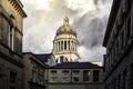 Nottingham city centre skyline with council house dome roof old buildings with sunshine and clouds lit up with golden hour light Royalty Free Stock Photo