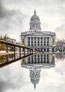 Nottingham city centre skyline with council house dome roof reflected mirror image of old buildings in water. Lines of symmetry Royalty Free Stock Photo