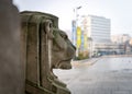 Deserted Nottingham empty market square on foggy morning during Covid 19 pandemic lockdown stone carved lion outside council house
