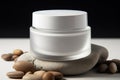 Nourishing balance white rock holds skincare moisture vessel, promoting healthy skin hydration