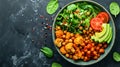 Nourishing Buddha Bowl: A Wholesome Medley of Aloo-Gobi, Chickpeas, Tomato, Avocado, Tabule Salad, a