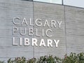 A close up to the Calgary Public Library logo at the downtown location