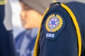 A close up to an uniform of the Alberta Emergency Medical Services patch