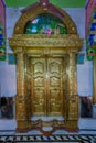 Golden door and frame in centre shrine has the idols of Ghanashyam Maharaj, Narayan and Laxmi;in oldest swaminarayan temple mumba