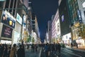 Nov 26 2023 Japan, Tokyo, Ginza, pedestrian traffic in street, dusk Royalty Free Stock Photo