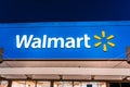 Nov 23, 2019 Mountain View / CA/ USA - Night view of Walmart sign above the store entrance to one of their locations in south San