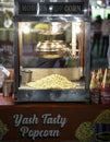 28 NOV, raipur, chhattisgar, Scattered salted popcorn, Texture. Film and cinema concept, popcorn selling in popcorn machine,