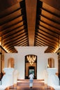 Luxury asian Thai resort entrance with high wooden ceiling, warm