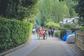 !2 Nov 2013 Unidentified man with a rickshaw and tourists at Chikurin-no-michi Royalty Free Stock Photo