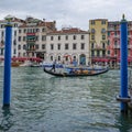 Nov 14, 2022: Venice, Italy - Gondolier carrying tourists on the Venetian Grand Canal Royalty Free Stock Photo