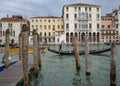 Nov 14, 2022: Venice, Italy - Gondolier carrying tourists on the Venetian Grand Canal Royalty Free Stock Photo