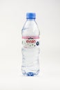 Bottle of the Evian natural mineral water on a white background. Made in the French Alps.