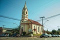 Small church with steeple in a street corner Royalty Free Stock Photo