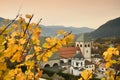 Novacella Monastery with vineyards during autumn season. Located in Varna, Bolzano, Trentino Alto-Adige, Italy