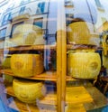 Novara, Italy - October 17, 2016:Big cheeses in a shop window Royalty Free Stock Photo